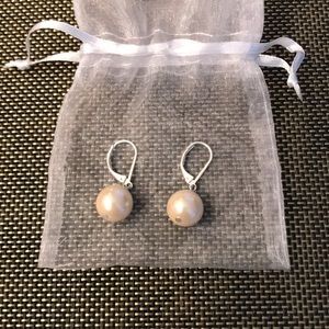 Pearl earrings.